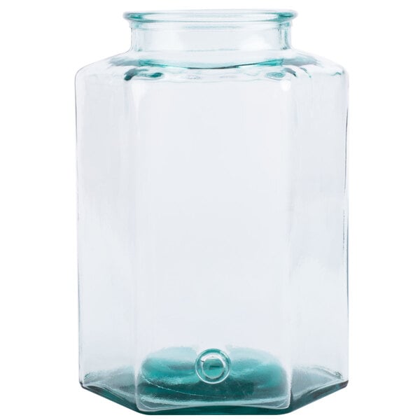 A clear glass jar with a round bottom and a blue lid.