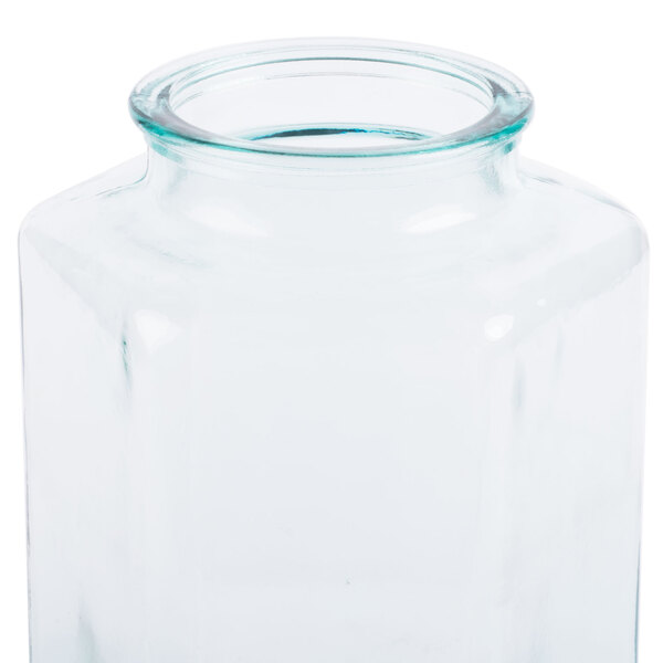 A Cal-Mil clear glass beverage dispenser chamber.