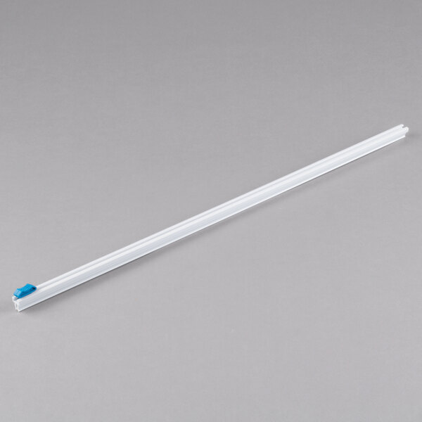 A white plastic Edlund film dispenser blade with a blue tip.