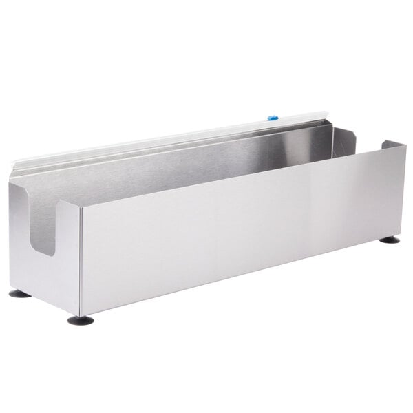 A stainless steel rectangular film and foil dispenser with a blue button.