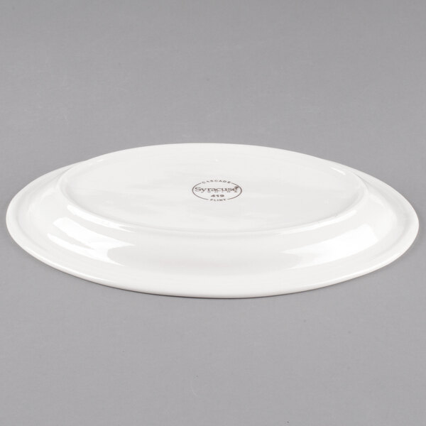 A white oval Libbey porcelain platter.