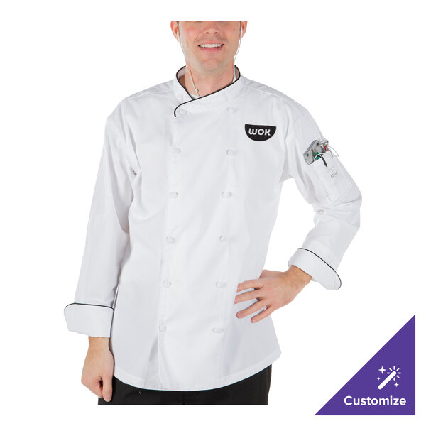 A man wearing a Mercer Culinary white chef coat with black piping.