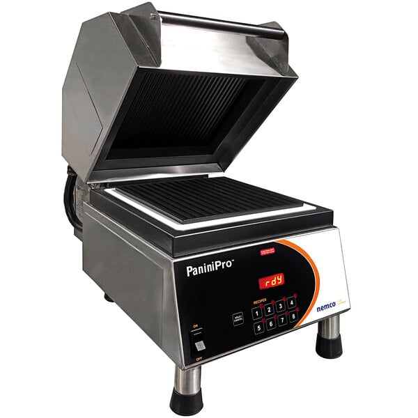 A Nemco PaniniPro single high-speed panini press with grooved top and bottom plates on a counter in a professional kitchen.