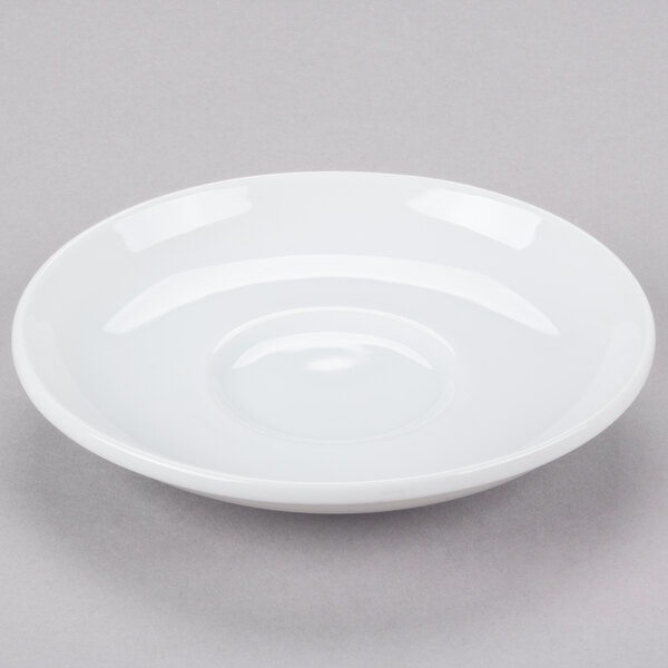 A white Libbey porcelain tea saucer with a circular shape.