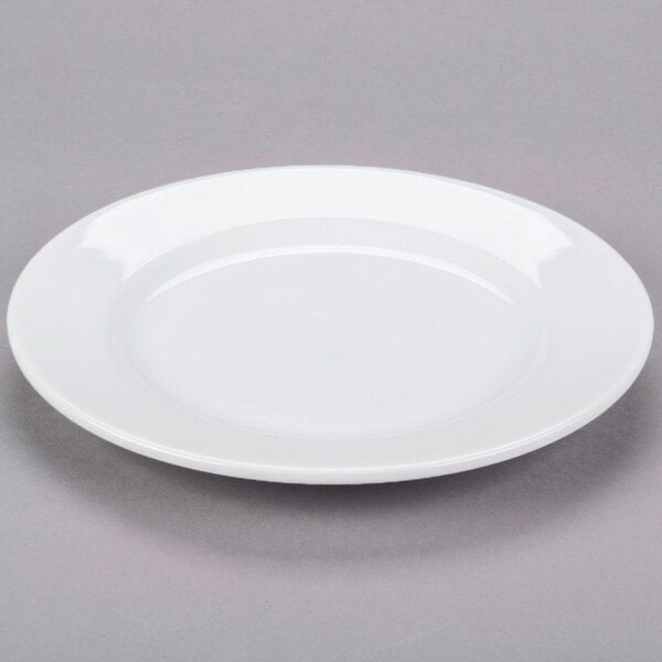 A white Libbey porcelain plate with a circular shape and a rim.