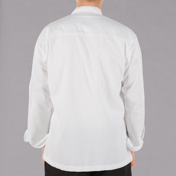 A man wearing a white Mercer Culinary chef jacket with the back view.