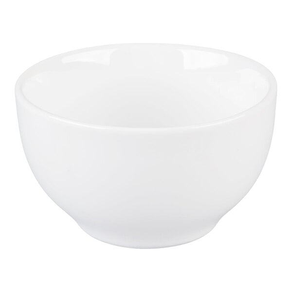 A plain white, round porcelain bowl with a smooth surface.