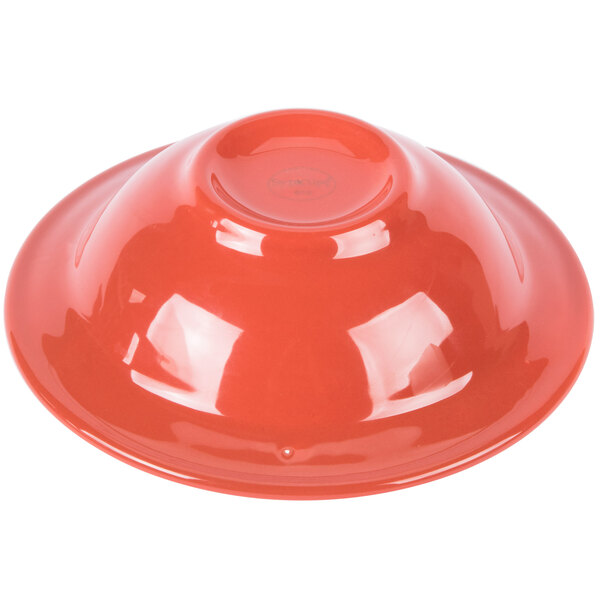 A close-up of a Libbey cayenne carved porcelain grapefruit dish with a lid on top.