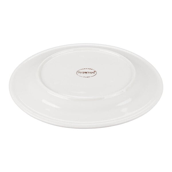A white round plate shown upside down with a logo and text at the center of its base.