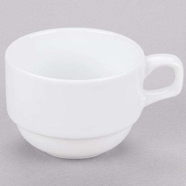A white Libbey porcelain cup with a handle.