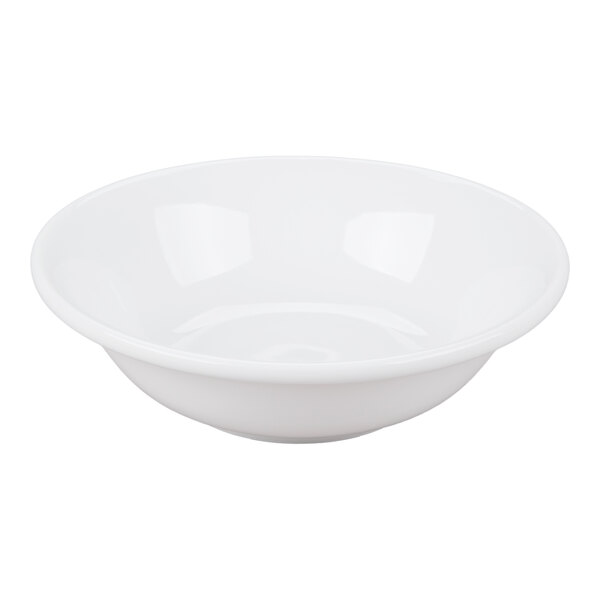 A plain white, round porcelain bowl with smooth sides and a glossy finish.
