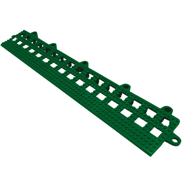 A hunter green plastic interlocking drainage tile with beveled edges and holes.