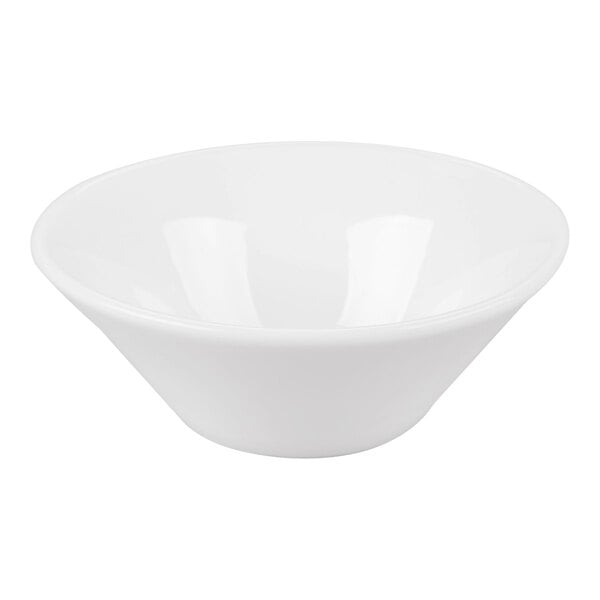 A plain white, round porcelain bowl with a smooth surface and slightly flared sides.