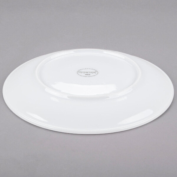 A white Libbey porcelain coupe plate.