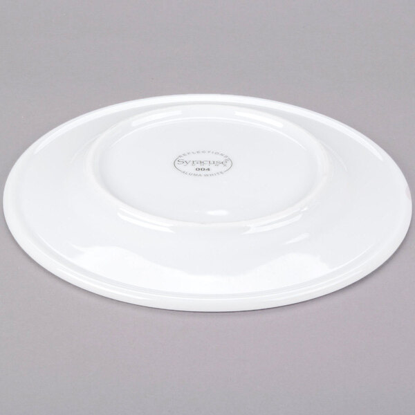 A white Libbey Reflections porcelain plate with a circular rim.