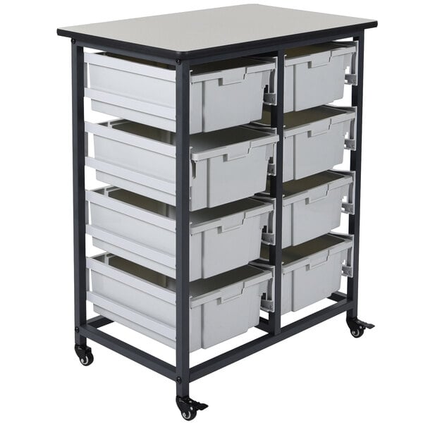 A white and black Luxor storage bin cart with large white bins on it.