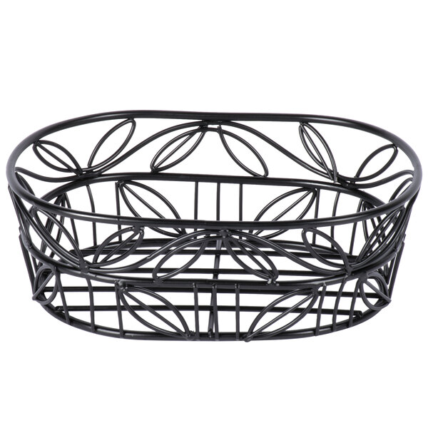An American Metalcraft black wrought iron oval basket with a leaf design.
