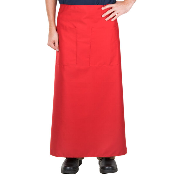 A person wearing a red Intedge Bistro apron with 2 pockets.