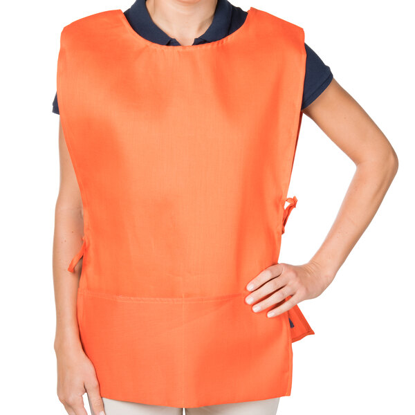 An orange Intedge cobbler apron with pockets.