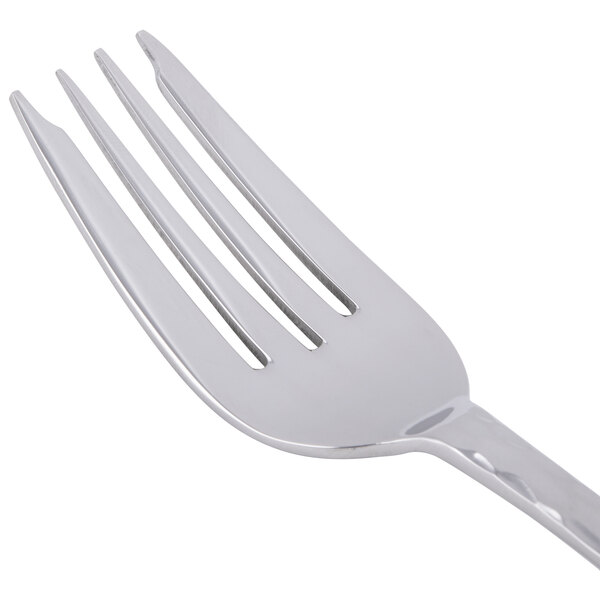 A close-up of a Libbey Aspire stainless steel salad fork with a silver handle.