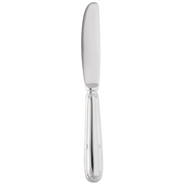A silver bread and butter knife with a solid handle.