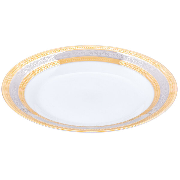 A white porcelain plate with a gold rim.