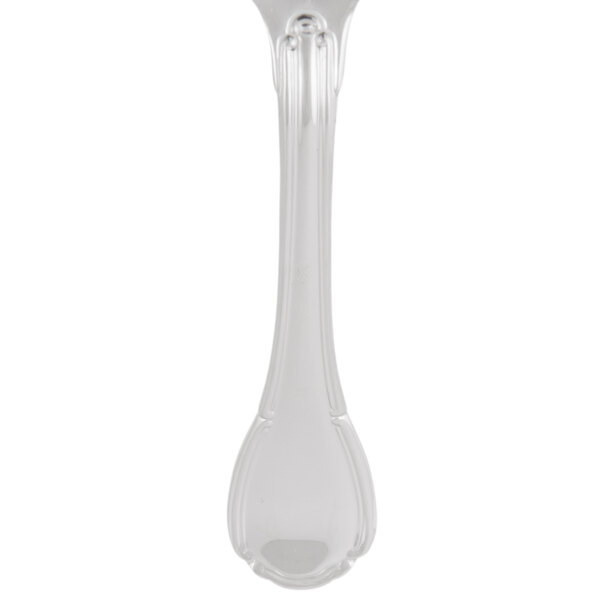 A Reserve by Libbey stainless steel dessert spoon with a Baroque handle.