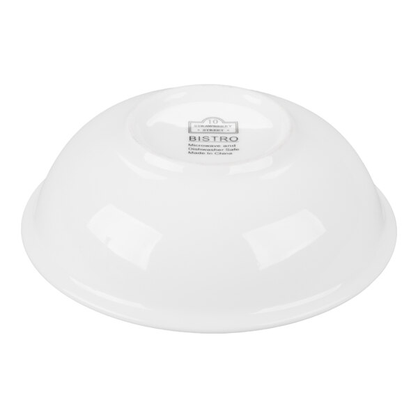 A white porcelain fruit bowl turned upside down.