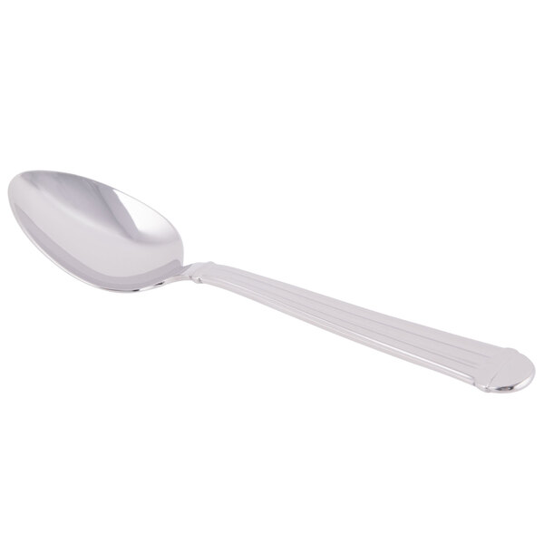 A Libbey Aegean stainless steel dessert spoon with a long handle.