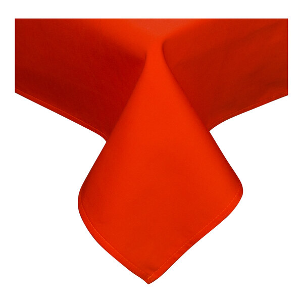 An orange rectangular tablecloth with a folded edge on a white surface.