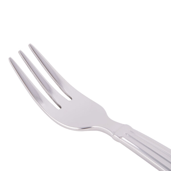 A Libbey stainless steel cocktail fork with a silver handle.