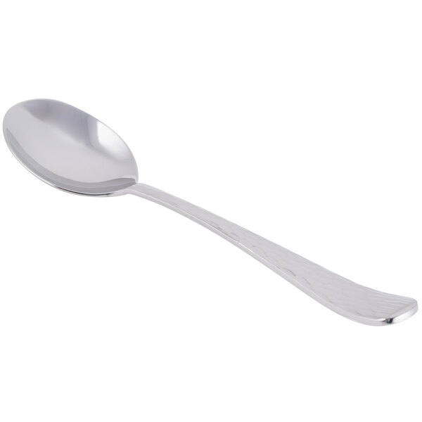 A close-up of a Libbey stainless steel bouillon spoon with a white background.