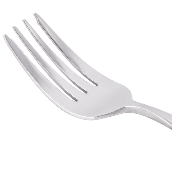 A close-up of a Libbey stainless steel salad fork with a silver handle.