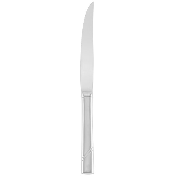 A Libbey stainless steel steak knife with a solid handle.