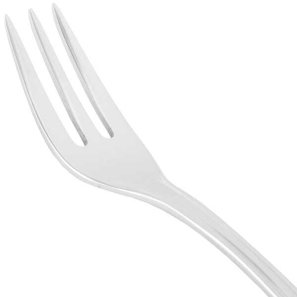 A World Tableware stainless steel cocktail fork with a white handle.