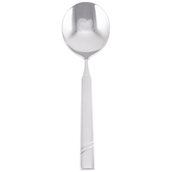 A silver bouillon spoon with a white handle.