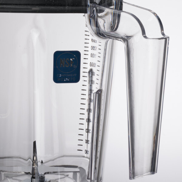 A Waring clear copolyester blender jar with a handle.