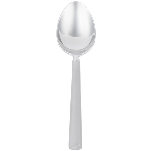 A Libbey stainless steel dessert spoon with a white handle.