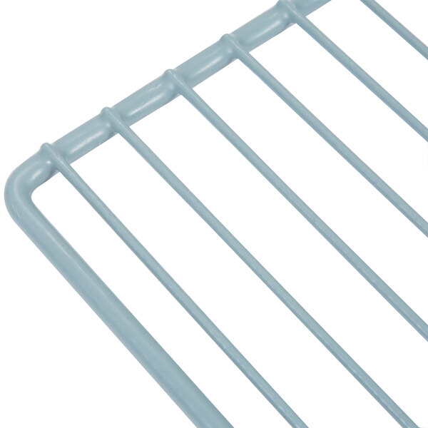 A Turbo Air coated wire shelf with metal handles.