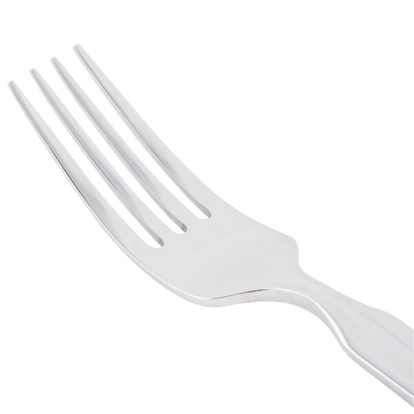 A close-up of a Libbey Madison stainless steel dinner fork with a silver handle.