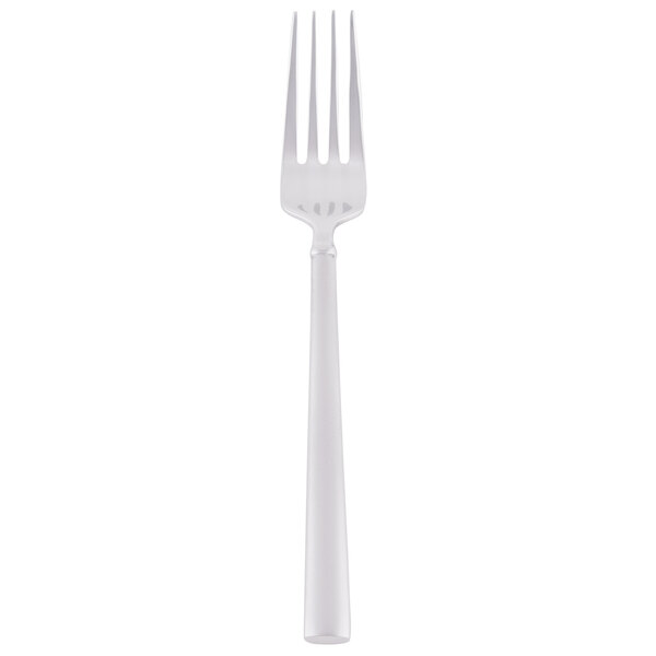 A close up of a Libbey stainless steel utility fork with a white handle.