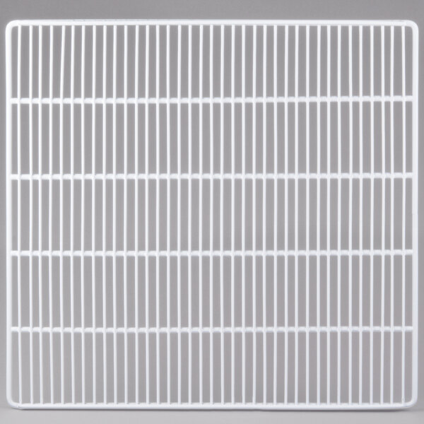 A white coated wire shelf with a grid pattern.