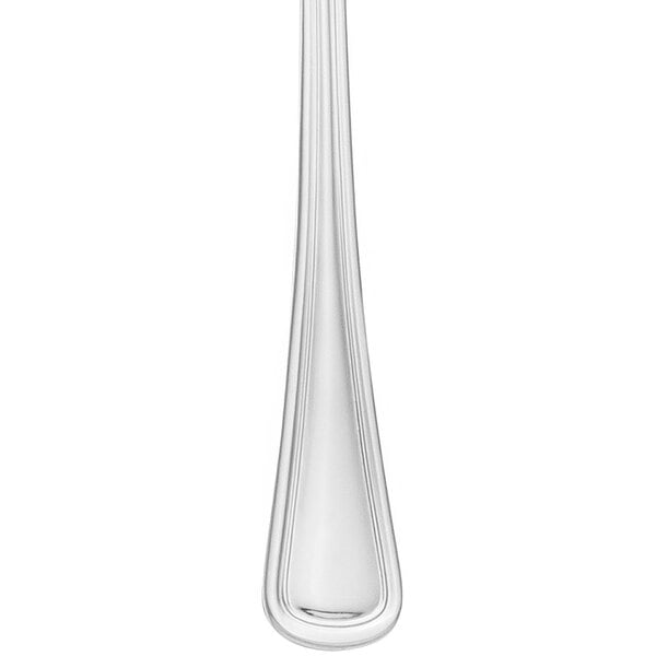 A Libbey stainless steel dinner fork with a long handle and classic rim design.