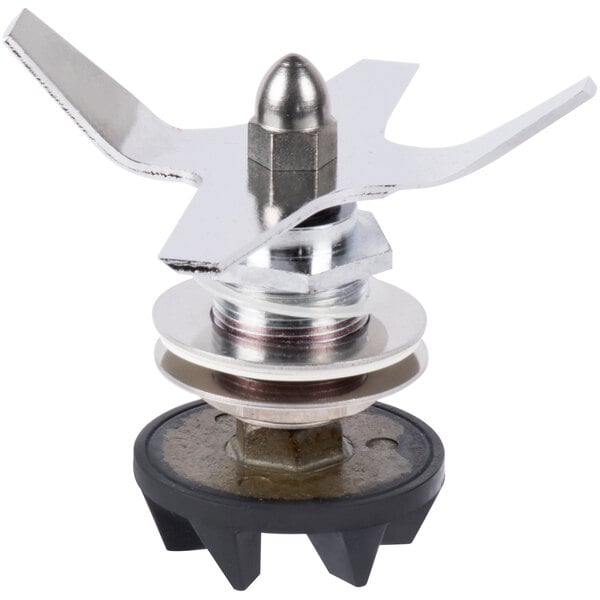 A Waring blending assembly with a metal blade on a screw.
