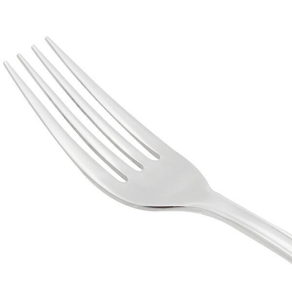 A close-up of a Libbey stainless steel dinner fork with a silver handle.