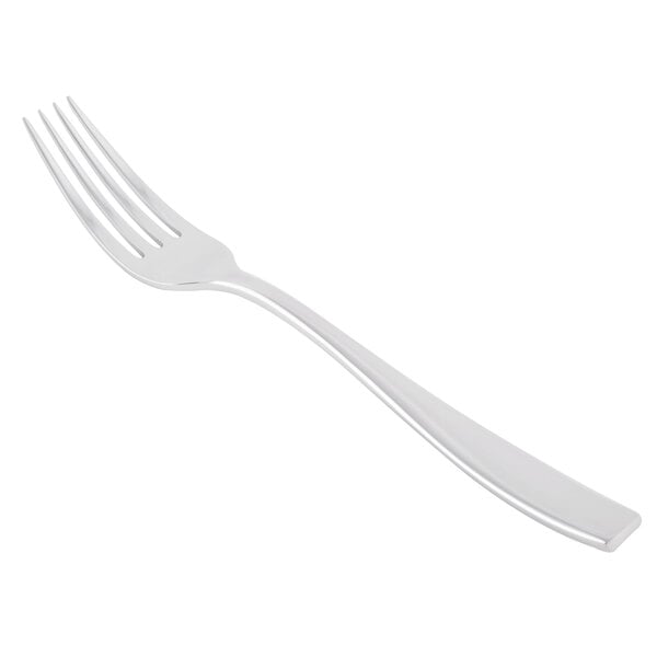 A silver Libbey stainless steel dinner fork with a white background.