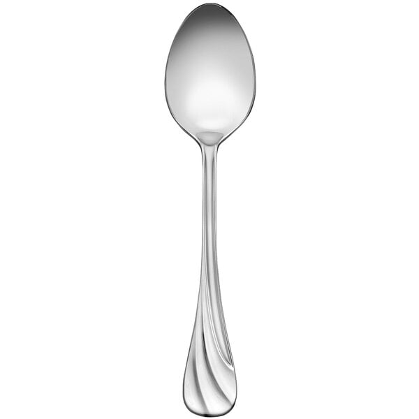 A close-up of a Libbey stainless steel dessert spoon with a curved handle.