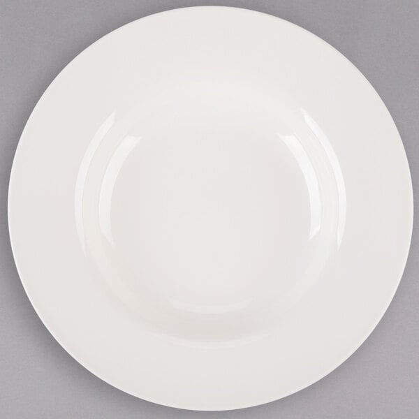 A Libbey porcelain pasta bowl with a wide white rim.