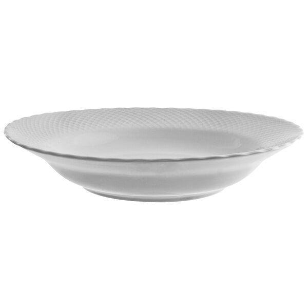 A 10 Strawberry Street White Wicker porcelain bowl with a patterned rim.