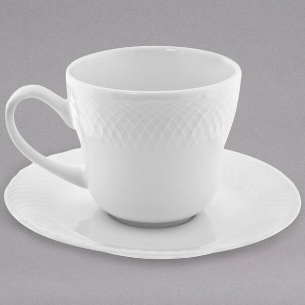 A 10 Strawberry Street White Wicker porcelain cup and saucer on a white background.